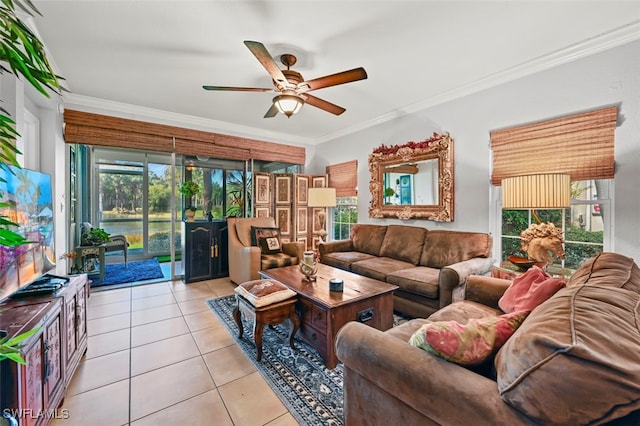 tiled living room with crown molding, a healthy amount of sunlight, and ceiling fan