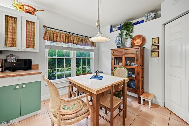 view of tiled dining space