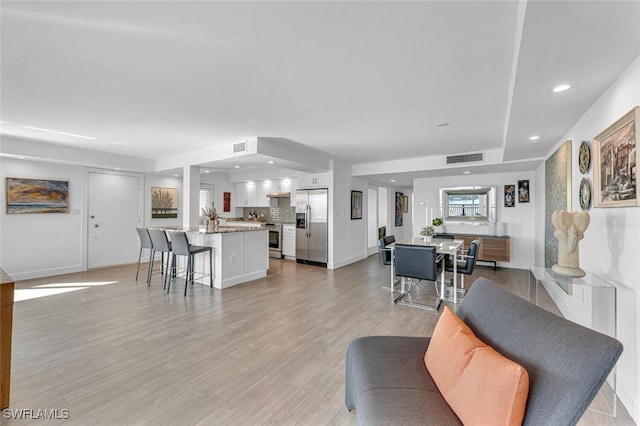 living room featuring light hardwood / wood-style flooring