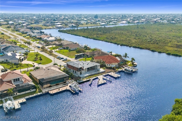 drone / aerial view featuring a water view