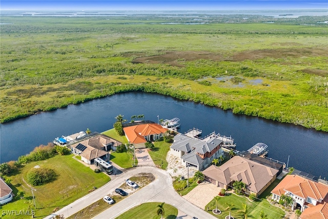 drone / aerial view with a water view