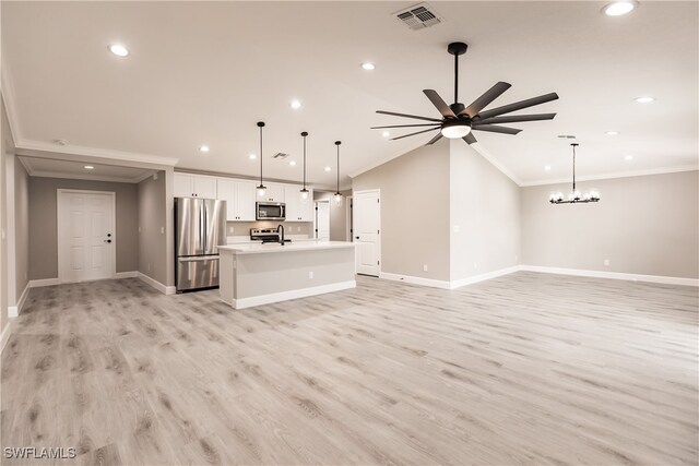 unfurnished living room with light wood-type flooring, visible vents, crown molding, and lofted ceiling