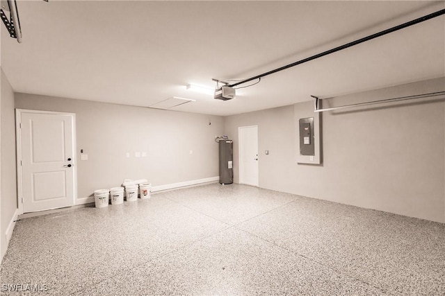 garage featuring a garage door opener, electric water heater, and electric panel