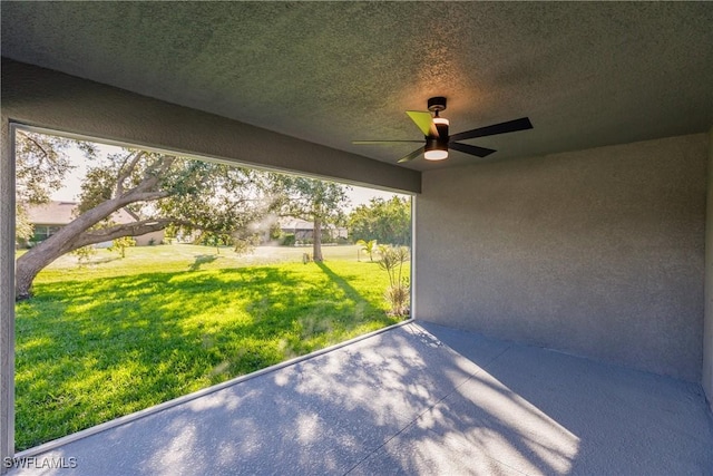 view of patio featuring a ceiling fan