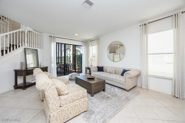 living room with light tile patterned floors