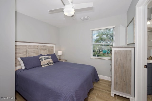 bedroom featuring ceiling fan and light wood-type flooring