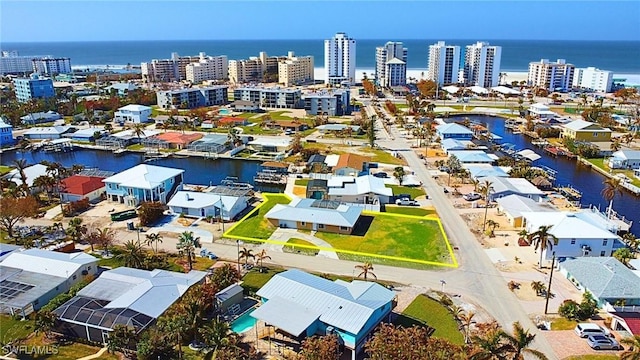 bird's eye view with a view of city and a water view