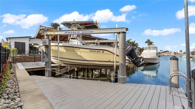 dock area with a water view