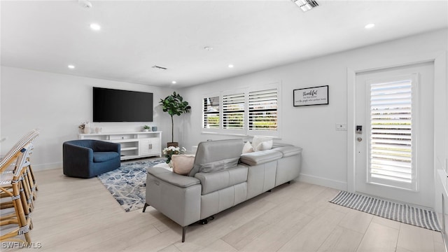 living room featuring light hardwood / wood-style flooring