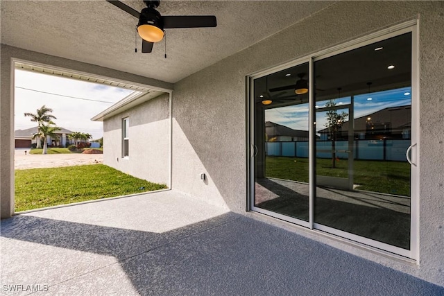 view of patio / terrace with ceiling fan