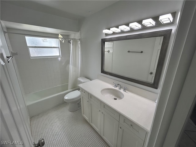 full bathroom with vanity, shower / tub combo, toilet, and tile patterned floors