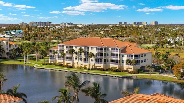 birds eye view of property featuring a water view