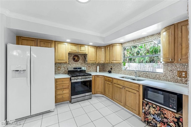 kitchen with stainless steel appliances, ornamental molding, sink, light tile patterned floors, and tasteful backsplash