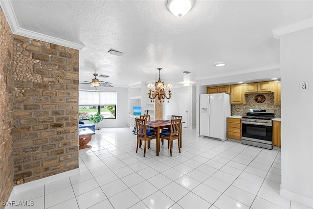 kitchen with crown molding, white fridge with ice dispenser, tasteful backsplash, and stainless steel gas range