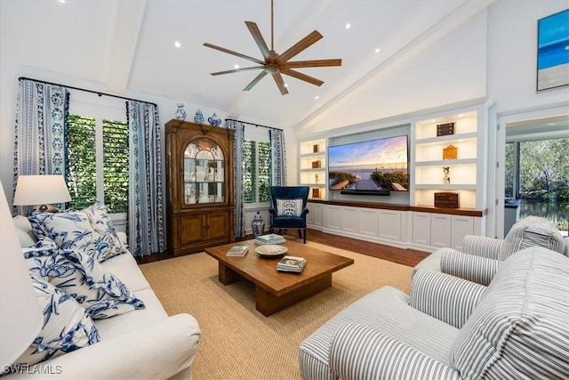 living room featuring light hardwood / wood-style floors, a wealth of natural light, and ceiling fan