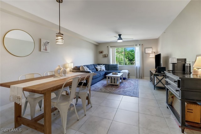 tiled living room with ceiling fan