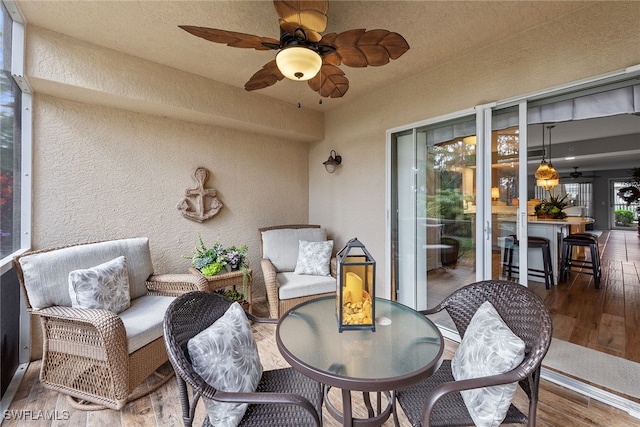 view of patio / terrace featuring ceiling fan