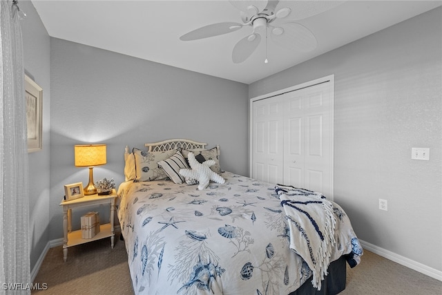 bedroom featuring dark colored carpet, a closet, and ceiling fan