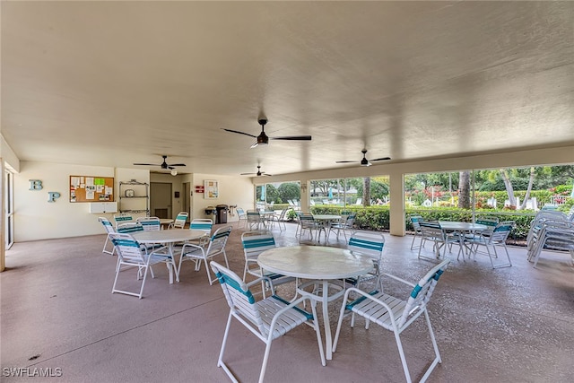 view of patio featuring ceiling fan