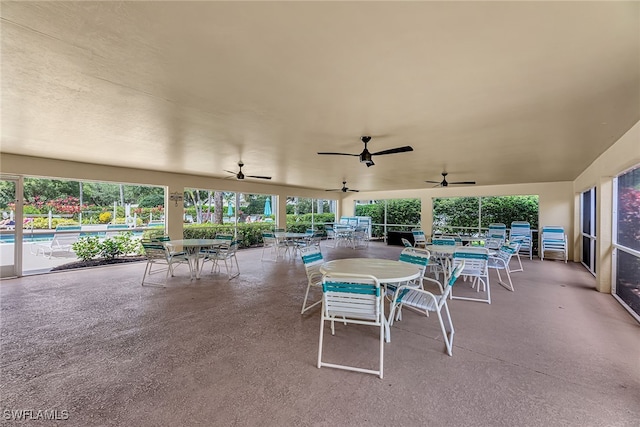 view of patio featuring ceiling fan