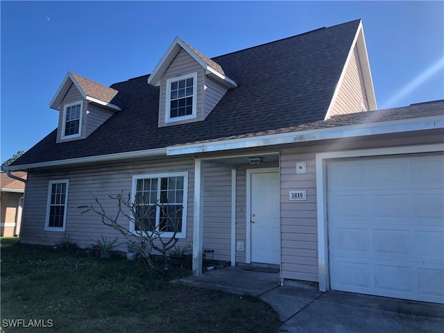 3819 5th St SW, Lehigh Acres, FL 33976 - view of front facade featuring a garage