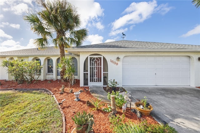 single story home with a garage