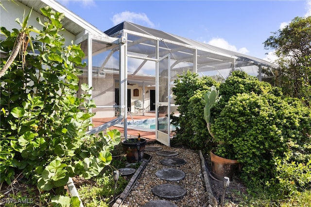 view of patio / terrace with a lanai