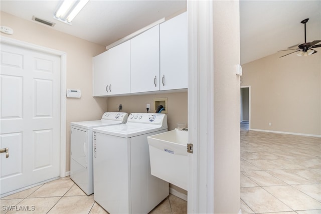 laundry room featuring cabinets, ceiling fan, light tile patterned floors, separate washer and dryer, and sink