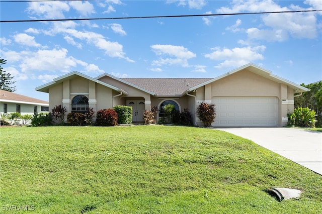 single story home featuring a front yard and a garage