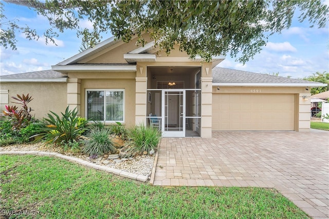 view of front of home featuring a garage