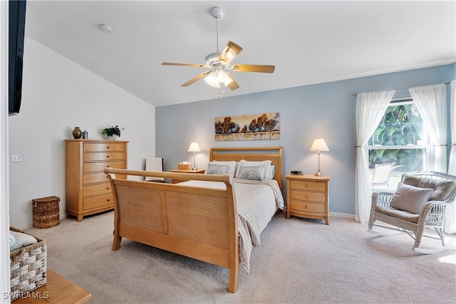 carpeted bedroom with lofted ceiling and ceiling fan