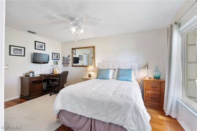 bedroom featuring ceiling fan and light hardwood / wood-style floors