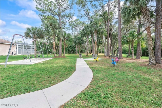 view of property's community featuring a yard