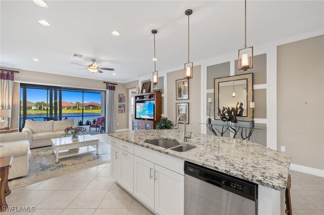 kitchen with white cabinetry, dishwasher, sink, a kitchen island with sink, and ceiling fan