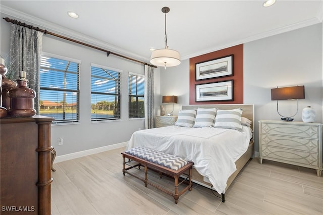 bedroom featuring crown molding