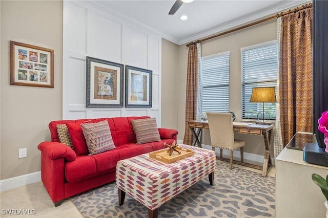 living room featuring ceiling fan and ornamental molding