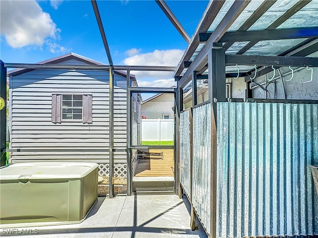 view of property exterior with a patio