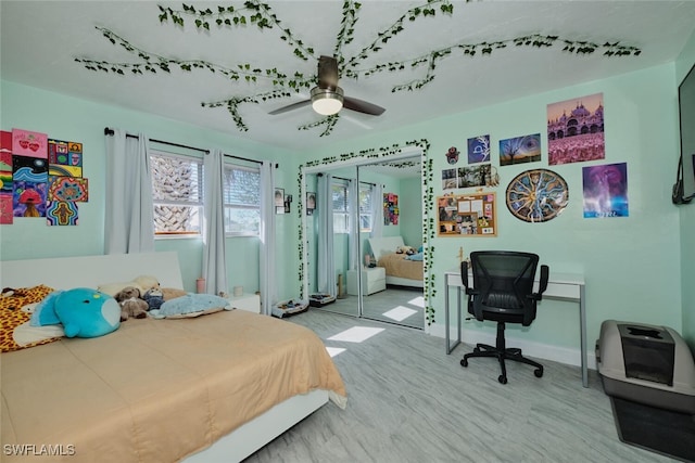 bedroom featuring a closet and ceiling fan