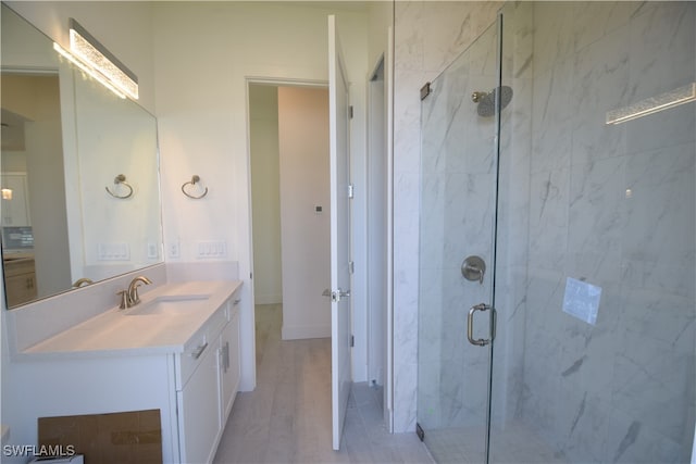 bathroom featuring vanity, hardwood / wood-style floors, and walk in shower