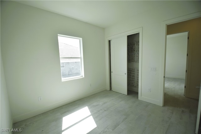 unfurnished bedroom with light hardwood / wood-style flooring