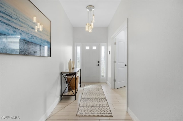 entryway featuring light tile patterned flooring