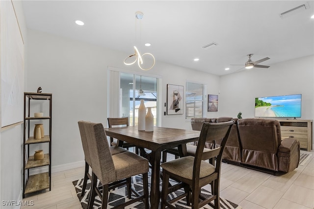 dining area with ceiling fan