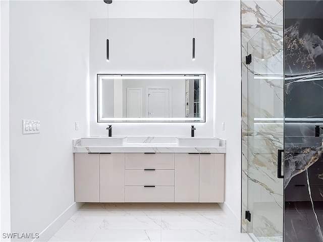 bathroom featuring vanity and an enclosed shower