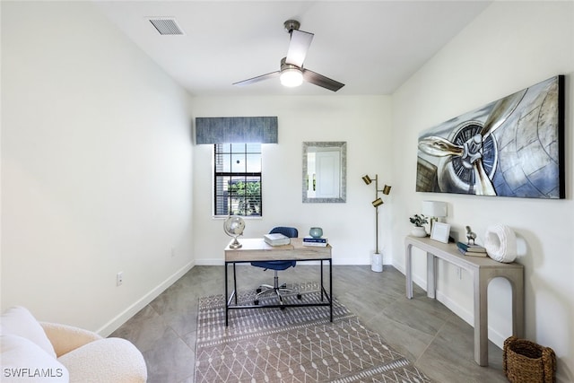 office area featuring ceiling fan and tile patterned flooring