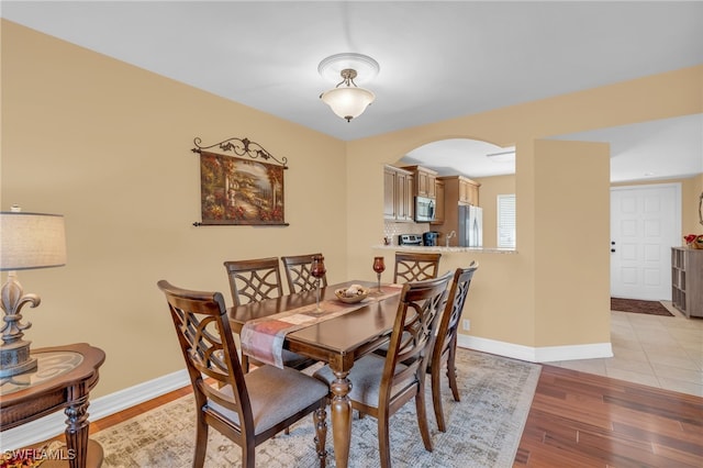 dining room featuring light hardwood / wood-style flooring