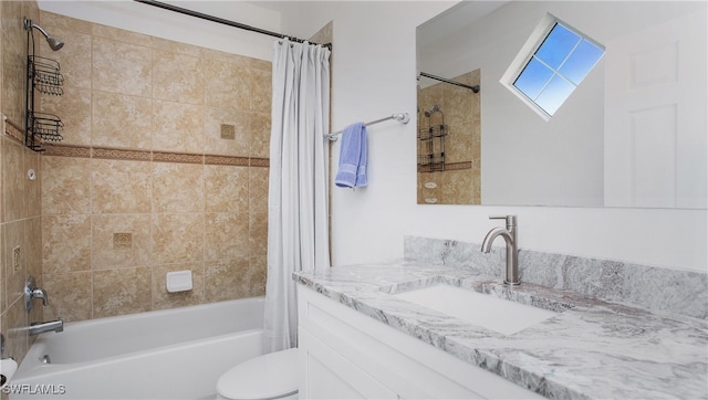 full bathroom featuring shower / tub combo with curtain, vanity, and toilet