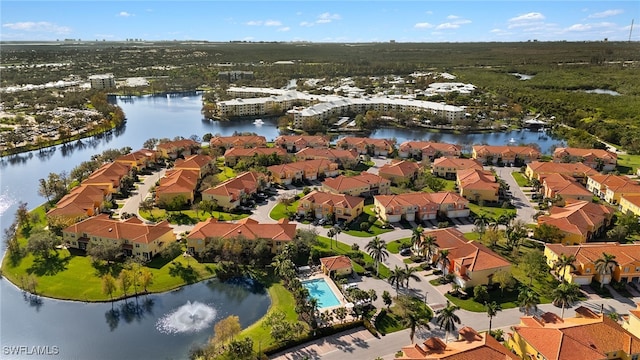 bird's eye view with a water view