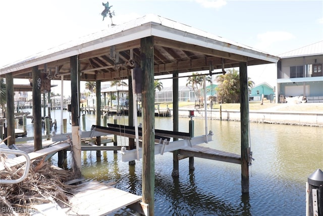 view of dock with a water view