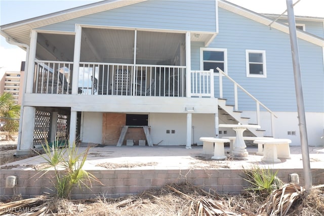 rear view of property with a patio