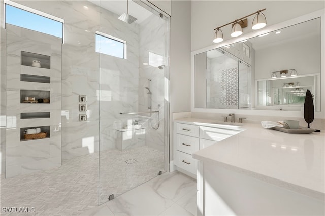 bathroom featuring vanity and walk in shower